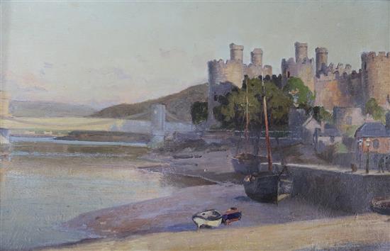 Julius Hare (1859-1952) two oils on canvas, Caernarfon Castle and Coastal scene, signed 22 x 35cm.